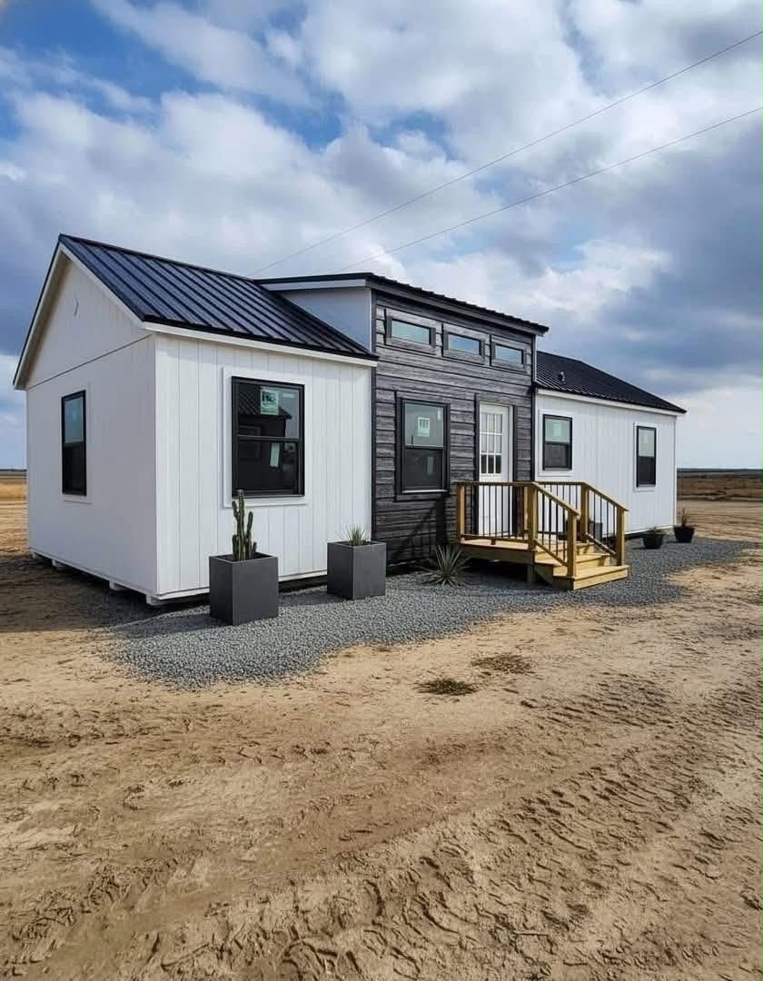 Used renewed 2023Platinum — Classic lines, timber porch.